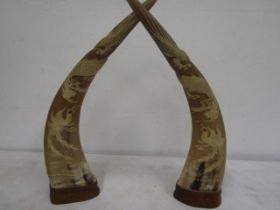 2 Oriental decorated horns