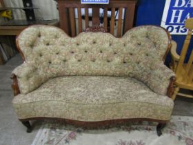 A 1920's floral sofa