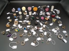 A collection of 63 costume jewellwey rings