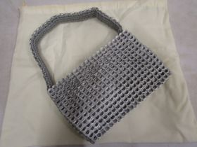 A silver ring-pull handbag made by village women in Peru approx 20-30 years old in great condition