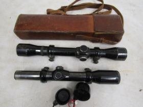2 German rifle scopes one in leather case
