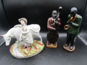 Staffordshire cow and milkmaid and 2 musicians cow's horn and ear are broken