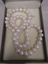 A set of pearls with receipt, never worn