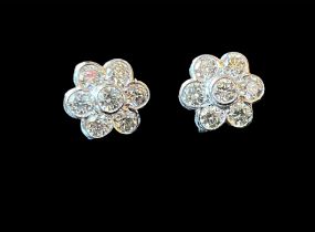 Pair of 2.15ct diamond daisy earring set in 18k white gold