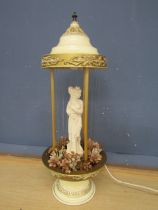 Retro mineral oil rain lamp with central lady statuette