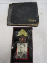 An album of WW2 era campaign and family photographs inc Fusilier glass photo (broken)