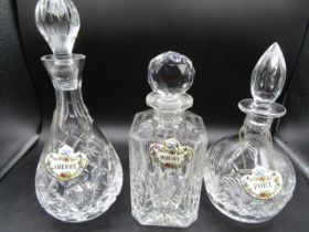 3 cut glass decanters with coalport ceramic markers