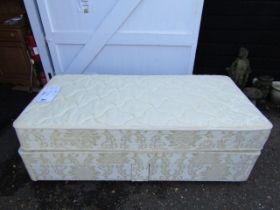 Single divan bed with drawers to base