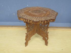 Small carved Indian table H33cm approx