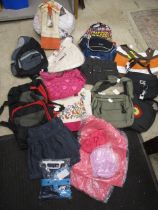 Collection of bags and some clothing, many new with tags