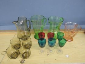 Coloured glass jugs and glasses