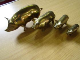 set 4 brass pigs