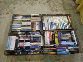 4 Boxes of mixed books and DVD's