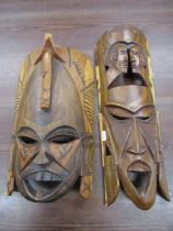 2 Kenyan treen masks  longest 45cm