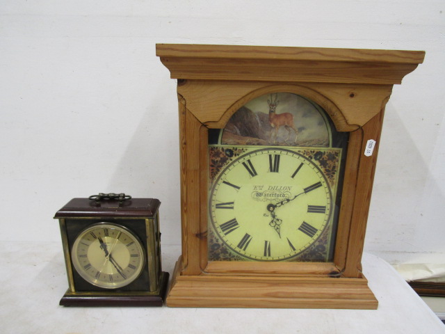 A pine surround clock and a Metamic clock- both battery operated