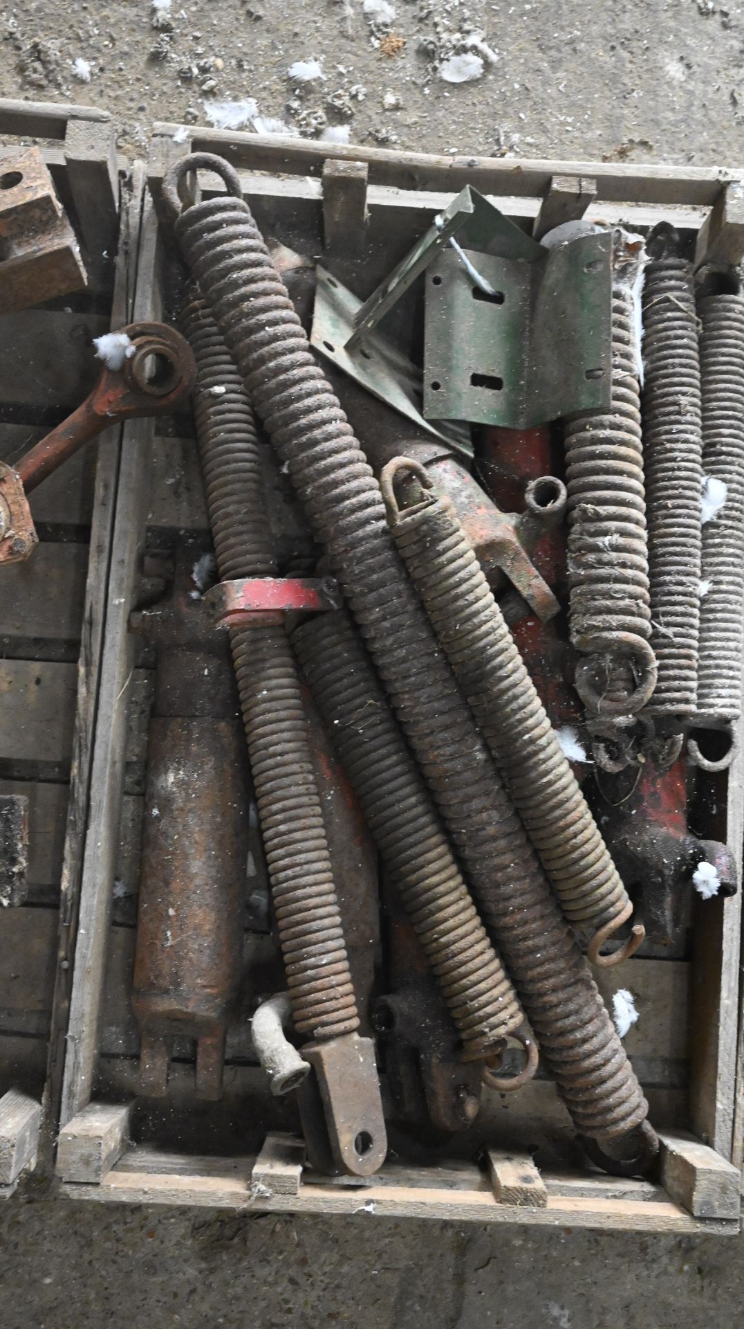 Collection of tractor springs and hydraulic rams