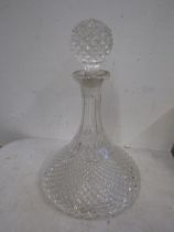 A vintage crystal ships decanter