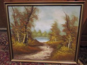 Signed oil on canvas of a woodland scene in gilt frame 56cm x 66cm approx