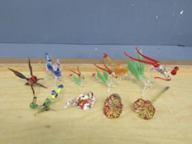 Glass dragons, flowers and animals