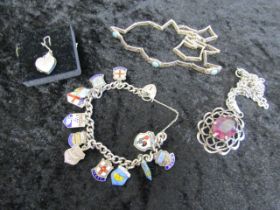 Silver charm bracelet with enamel souvenir hallmarked charms, necklace stamped 925 with blue stones,