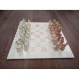 'Soapstone' chess set with hand carved animal pieces