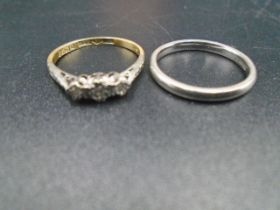 An 18ct  gold and platinum ring set with 3 diamonds size M, 1.90g weight, plus a 950 platinum band