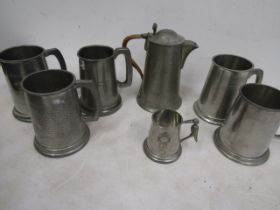 Pewter tankards and coffee pot