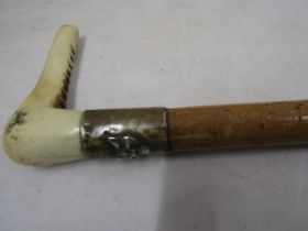 A antler handled hunting crop with fox emblem