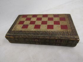 An antique  'secret backgammon board'   years ago it was deemed illegal to play backgammon in a