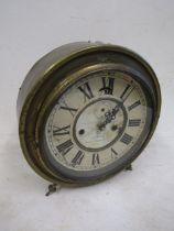 A vintage brass clock 26cm diameter