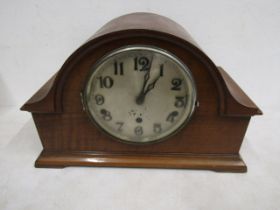 A mantle clock with key