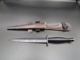 A replica Fairbairn Sykes style Commando Knife with leg/belt sheath