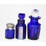 Three vintage blue glass perfume bottles