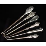 Six sterling silver handle button hooks