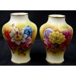 Pair of Royal Worcester signed floral posy vases