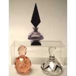 Three various perfume bottles