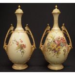 Pair of Royal Worcester blush ivory lidded urns