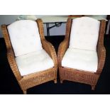 Two large cane armchairs