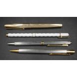 Four various branded pens