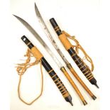 Pair of South east Asian Dha swords