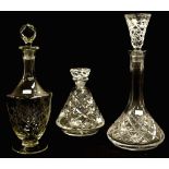 Three various cut crystal spirit decanters