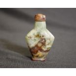 Carved stone snuff bottle