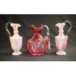 Three vintage decorative glass jugs