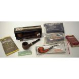 Collection of various pipes and tobacco