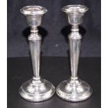 Pair of sterling silver candlesticks