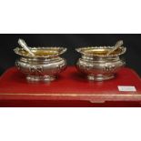 Cased pair George V sterling open salts & spoons