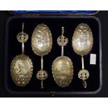 Cased set four Continental silver serving spoons