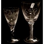 Two English etched crystal wine glasses