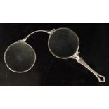 Silver lorgnette with plain deco handle