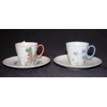 Two handpainted cups & saucers